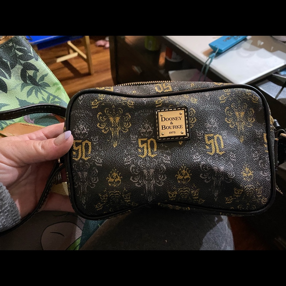 Disney Dooney & Bourke 50th anniversary Haunted mansion small purse.